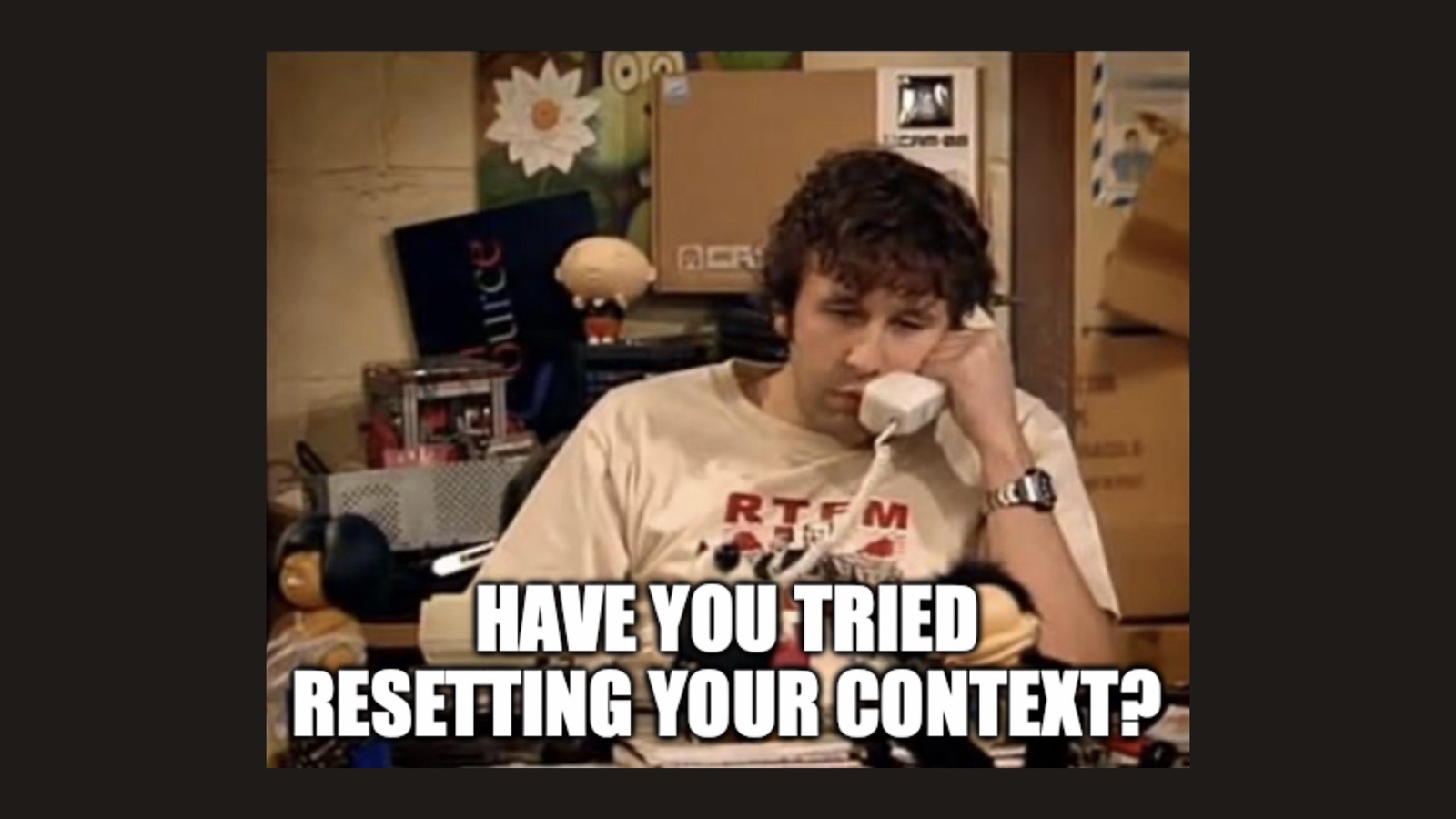 Meme from The IT Crowd: Roy on the phone, captioned Have you tried resetting your context?
